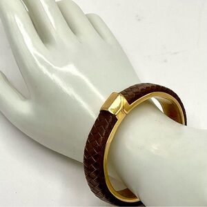 Fashionable Signed Vince Camuto Leather and Gold Tone Hinged Bangle Bracelet
